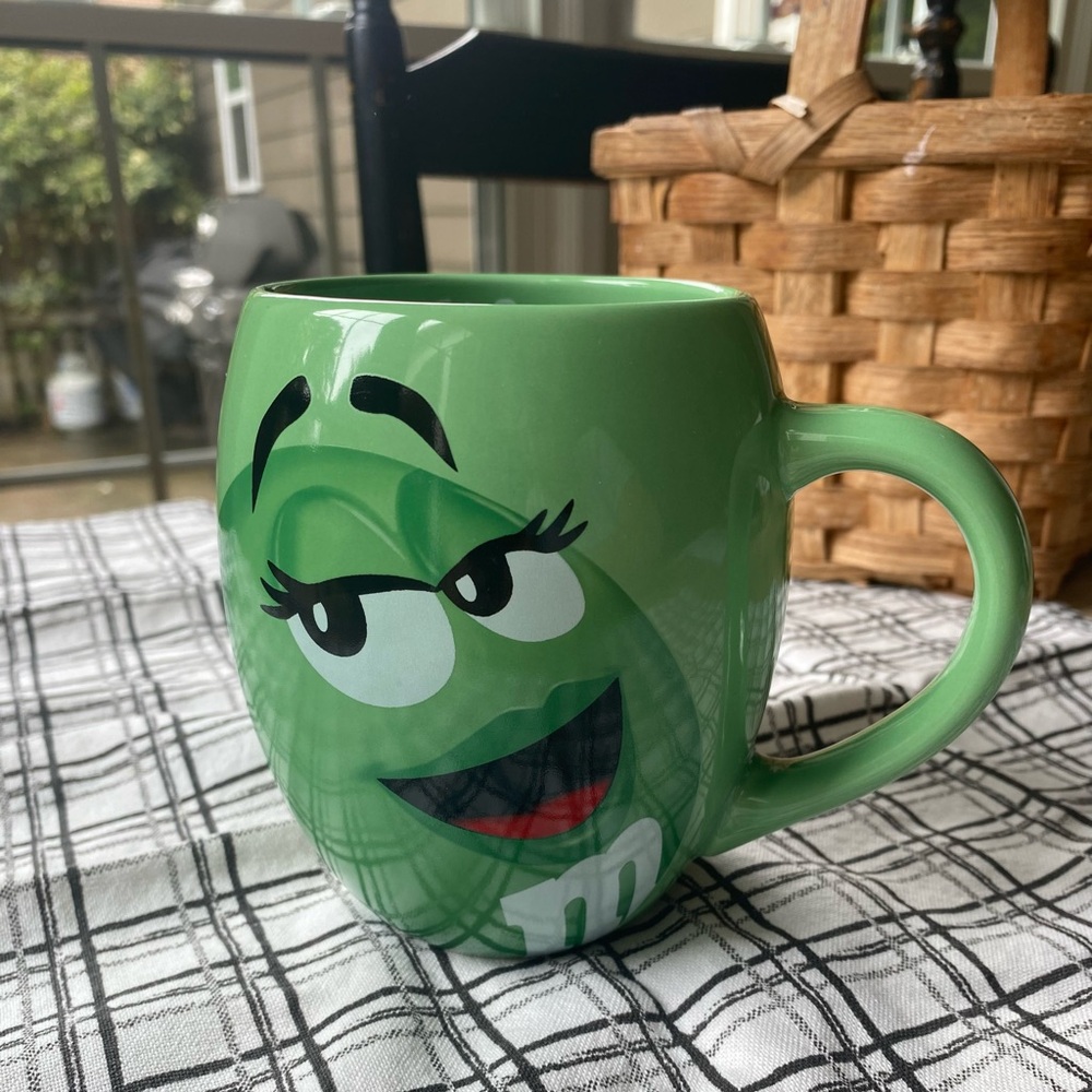 Green M&M Ceramic Mug “I MELT FOR NO ONE!”